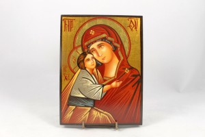 Icona dipinta a mano raffigurante Madonna con Bambino veste arancio.