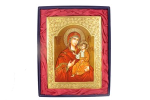 Importante icona dipinta a mano con lavorazione a sbalzo in confezione lusso, raffigurante Madonna con Bambino. Dimensioni icona cm 30 x 40.